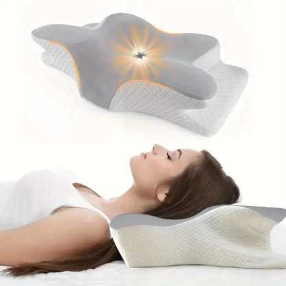 Oreiller cervical Somna en mousse à mémoire posé sur un lit