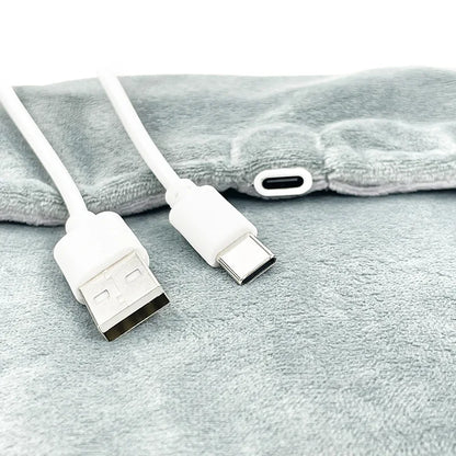 Tapis chauffant USB Somna glissé dans un lit pour réchauffer les draps