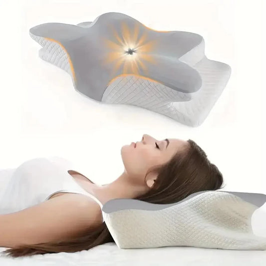 Oreiller cervical Somna en mousse à mémoire posé sur un lit