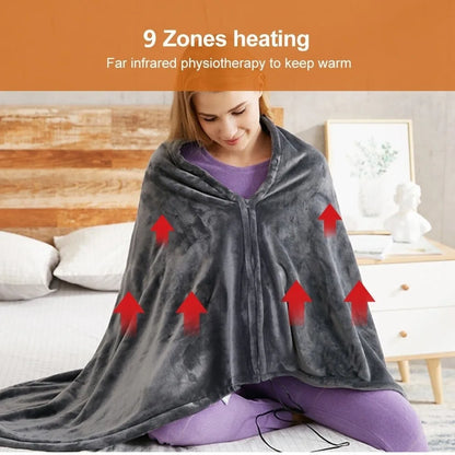 Tapis chauffant Somna en velours posé sur un divan dans une chambre douce