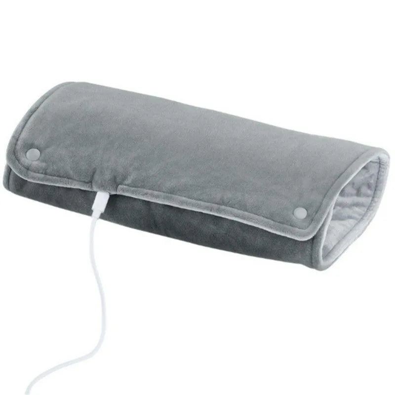 Tapis chauffant USB Somna glissé dans un lit pour réchauffer les draps