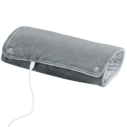 Tapis chauffant USB Somna glissé dans un lit pour réchauffer les draps
